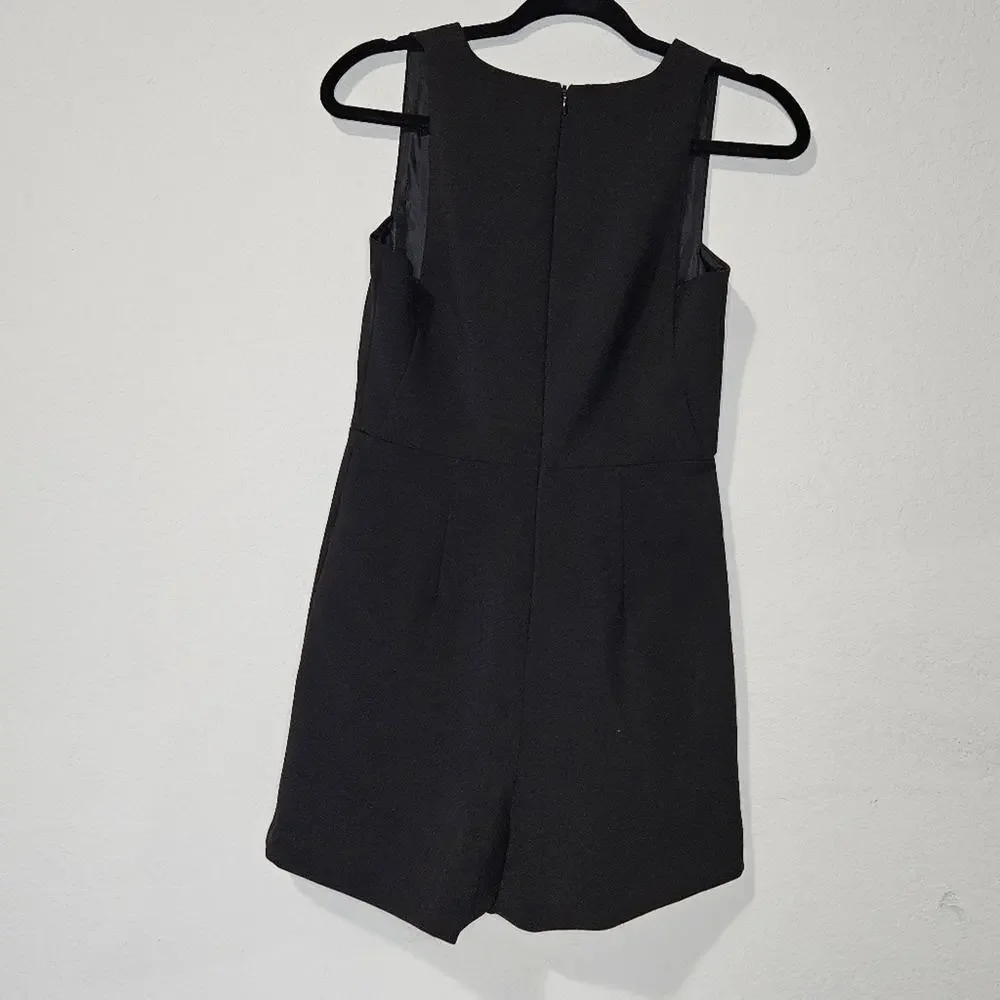 TOPSHOP black low cut romper with a back zipper